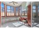 Bright main bathroom featuring a soaking tub, vanity, and large windows at 3608 Olive Branch Rd, Greenwood, IN 46143