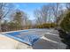 Covered pool with concrete surround at 3608 Olive Branch Rd, Greenwood, IN 46143