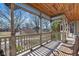Cozy porch featuring intricate woodwork and scenic views at 3608 Olive Branch Rd, Greenwood, IN 46143