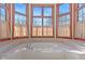 Bright bathroom features a soaking tub with natural light streaming in from surrounding windows at 3608 Olive Branch Rd, Greenwood, IN 46143
