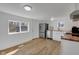 Bright kitchen with stainless steel fridge, white cabinets, wood countertops, and modern appliances at 3905 N Drexel Ave, Indianapolis, IN 46226