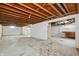 Unfinished basement with painted walls, concrete floor, and exposed ceiling at 4013 Priscilla Ave, Indianapolis, IN 46226