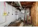 Unfinished basement with exposed ceiling, walls, and mechanical components at 4013 Priscilla Ave, Indianapolis, IN 46226