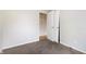 Bedroom with neutral walls and carpeted floor with an open closet at 4013 Priscilla Ave, Indianapolis, IN 46226