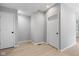 Neutral hallway showing modern doors and fresh paint at 516 N Chester Ave, Indianapolis, IN 46201