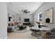 Open-concept living and dining area featuring modern furnishings and light, neutral tones at 516 N Chester Ave, Indianapolis, IN 46201