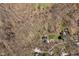 Stunning aerial view showcasing a secluded property nestled amongst wooded acreage at 534 1/2 Amos Dr, Zionsville, IN 46077