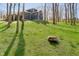 Expansive backyard featuring lush grass and mature trees, providing privacy at 534 1/2 Amos Dr, Zionsville, IN 46077
