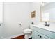 Stylish half bath with a modern sink, gold mirror, and fresh paint at 534 1/2 Amos Dr, Zionsville, IN 46077