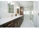Beautiful bathroom with dual vanity, quartz counters, and modern fixtures at 534 1/2 Amos Dr, Zionsville, IN 46077