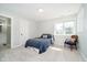 Cozy bedroom with carpet, natural light, ensuite bathroom, and chair at 534 1/2 Amos Dr, Zionsville, IN 46077