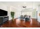 Comfortable living room with hardwood floors, ample natural light, and seamless access to outdoor views at 534 1/2 Amos Dr, Zionsville, IN 46077