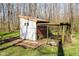 Small shed with a metal roof and a partially covered exterior, useful for storage or hobbies at 534 1/2 Amos Dr, Zionsville, IN 46077