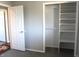 Bedroom closet with built in shelving and plenty of storage space at 5582 E State Road 144, Mooresville, IN 46158