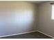 Neutral bedroom with updated wall panels and carpet, providing a clean and modern look at 5582 E State Road 144, Mooresville, IN 46158