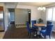 Bright dining room with a chandelier and seating for four at 5582 E State Road 144, Mooresville, IN 46158