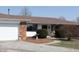 Close up on a welcoming front entrance with sidelights and landscaped walkway at 5582 E State Road 144, Mooresville, IN 46158