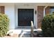 Charming entryway with black double doors, stylish rug, and neutral paint at 5582 E State Road 144, Mooresville, IN 46158