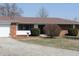 Beautiful brick ranch with a well-maintained front yard and lovely landscaping at 5582 E State Road 144, Mooresville, IN 46158