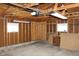 Inside the garage with unfinished walls, windows, and lighting at 5582 E State Road 144, Mooresville, IN 46158