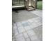 Paver stones leading to stairs and a new deck in backyard with gravel for landscaping and water management at 5603 S Randolph St, Indianapolis, IN 46227
