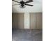 Bedroom featuring neutral carpeting and two closets, providing ample storage space at 5603 S Randolph St, Indianapolis, IN 46227