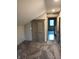 Bedroom featuring neutral carpeting, a closet, and an open doorway, offering a peaceful retreat at 5603 S Randolph St, Indianapolis, IN 46227