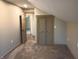 Comfortable bedroom with plush carpet and a closet, creating a relaxing and inviting space at 5603 S Randolph St, Indianapolis, IN 46227
