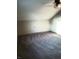 Neutral bedroom with a ceiling fan and plush carpeting, perfect for relaxation and comfort at 5603 S Randolph St, Indianapolis, IN 46227