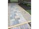 Paver walkway leading to the home's entrance, bordered by decorative gravel and mulch at 5603 S Randolph St, Indianapolis, IN 46227