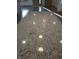 Close-up of kitchen island featuring a granite countertop at 5603 S Randolph St, Indianapolis, IN 46227