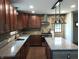 Well-appointed kitchen featuring granite countertops, stainless steel appliances, and stone backsplash at 5603 S Randolph St, Indianapolis, IN 46227