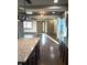 Open floor plan with hardwood floors and views of the living room and front doors at 5603 S Randolph St, Indianapolis, IN 46227