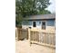 Charming outbuilding with a wooden deck, perfect for outdoor relaxation and entertaining at 5603 S Randolph St, Indianapolis, IN 46227