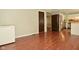 Open concept layout showcases the kitchen with stainless steel appliances and custom cabinets at 5909 Furnas Rd, Indianapolis, IN 46221