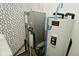 Mechanical room includes HVAC system, water heater and patterned wallpaper at 5909 Furnas Rd, Indianapolis, IN 46221