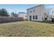 Backyard featuring a combination of grass, bare spots, a wood fence and a metal chain-link fence at 6663 Black Antler Cir, Indianapolis, IN 46217
