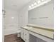Bathroom featuring updated light fixtures, countertops and flooring at 6663 Black Antler Cir, Indianapolis, IN 46217