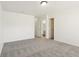 Spacious carpeted bedroom with connecting bathroom and closet at 6663 Black Antler Cir, Indianapolis, IN 46217