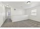 Spacious room featuring carpet flooring and a window at 6663 Black Antler Cir, Indianapolis, IN 46217