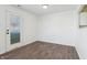 Dining area with hardwood floors and a glass door leading to the outside at 6663 Black Antler Cir, Indianapolis, IN 46217