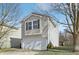 Charming two-story home featuring a two-car garage and well-maintained landscaping at 6663 Black Antler Cir, Indianapolis, IN 46217