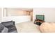 Upstairs living room includes plush furniture, TV and carpeted floor at 698 Ridge Gate Dr, Brownsburg, IN 46112