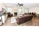 Bright living room with hardwood floors, fireplace, and modern decor at 698 Ridge Gate Dr, Brownsburg, IN 46112