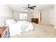 Comfortable main bedroom features a plush bed, carpet, and a window view, creating a relaxing atmosphere at 698 Ridge Gate Dr, Brownsburg, IN 46112