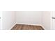 A simple room showcasing the flooring, base trim and neutral colored walls at 698 Ridge Gate Dr, Brownsburg, IN 46112