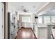 Kitchen featuring white cabinets, stainless steel appliances, and granite countertops at 6980 N Pennsylvania St, Indianapolis, IN 46220