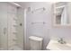 Bathroom featuring a standing shower, toilet, vanity, medicine cabinet and towel bars at 712 N Pendleton Ave, Pendleton, IN 46064