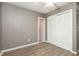 Cozy bedroom with a ceiling fan, neutral walls, and a closet, providing ample space for storage at 712 N Pendleton Ave, Pendleton, IN 46064