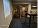Bright basement area with dark carpeting, gray walls, and open layout, great for entertaining or relaxing at 720 Erin Dr, Avon, IN 46123